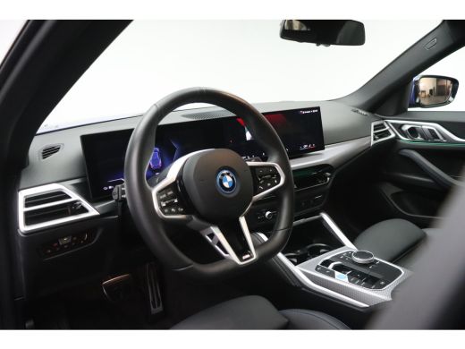 BMW i4 eDrive35 M Sport / Schuif-kanteldak / Trekhaak / Achteruitrijcamera / Stoelverwarming / Widescree... ActivLease financial lease