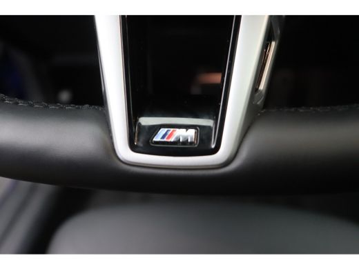 BMW i4 eDrive35 M Sport / Schuif-kanteldak / Trekhaak / Achteruitrijcamera / Stoelverwarming / Widescree... ActivLease financial lease