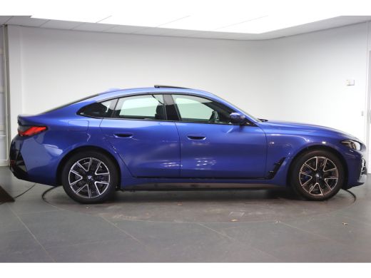BMW i4 eDrive35 M Sport / Schuif-kanteldak / Trekhaak / Achteruitrijcamera / Stoelverwarming / Widescree... ActivLease financial lease