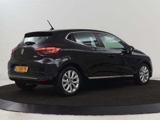 Renault Clio 1.6 E-Tech Hybrid 140 Intens | Stoelverwarming | Camera | Carplay | Stuurverwarming | Half leder ... ActivLease financial lease