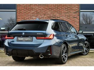 BMW 3 Serie Touring 330e M-Sport LCI-2 Pano Trekh ACC H/K 360 HUD 19inch