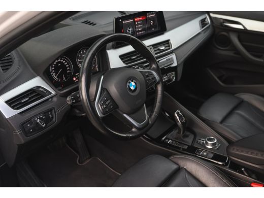 BMW X1 sDrive20i High Executive xLine Automaat / Panoramadak / Trekhaak / Sportstoelen / Achteruitrijcam... ActivLease financial lease