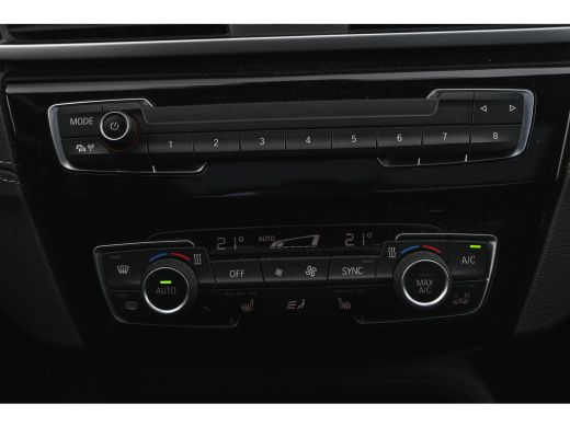 BMW X1 sDrive20i High Executive xLine Automaat / Panoramadak / Trekhaak / Sportstoelen / Achteruitrijcam... ActivLease financial lease