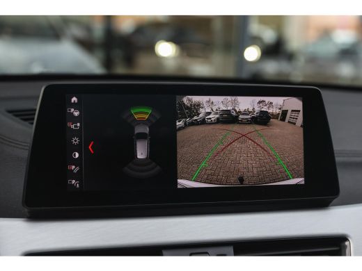 BMW X1 sDrive20i High Executive xLine Automaat / Panoramadak / Trekhaak / Sportstoelen / Achteruitrijcam... ActivLease financial lease