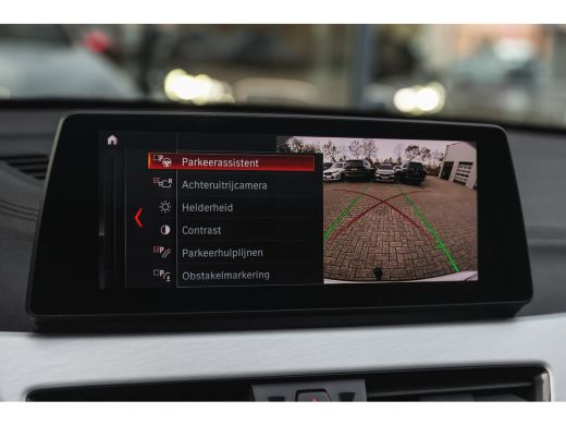 BMW X1 sDrive20i High Executive xLine Automaat / Panoramadak / Trekhaak / Sportstoelen / Achteruitrijcam... ActivLease financial lease
