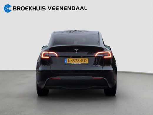 Tesla Model Y Long Range AWD 75 kWh | 1e eig. | Org. NL | Pano | Adap. Cruise | Trekhaak | Navigatie ActivLease financial lease