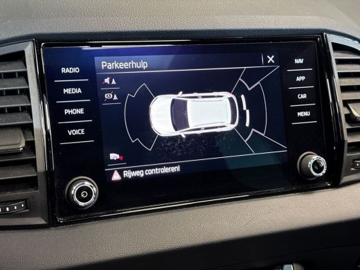 Skoda Karoq 1.5 150pk TSI ACT Sportline Business Panoramadak | Verwarmbare stoelen voor | Verwarmbare voorruit ActivLease financial lease