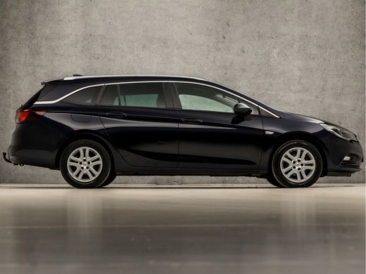 Opel Astra Sports Tourer 1.0 Sport (APPLE CARPLAY, GROOT NAVI, CLIMATE, TREKHAAK, SPORTSTOELEN, GETINT GLAS,... ActivLease financial lease