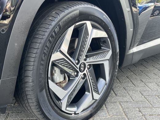 Hyundai Tucson 1.6 T-GDI 265pk PHEV Premium 4WD | Leder | Carplay | Climate | Keyless | Navigatie | Elek. Klep |... ActivLease financial lease