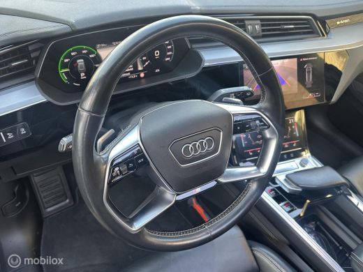 Audi e-tron e-tron 55 quattro advanced 95 kWh S-LINE PAKKET LUCHTVERING PANORAMADAK AUDI SPORTSTOELEN SFEERVE... ActivLease financial lease
