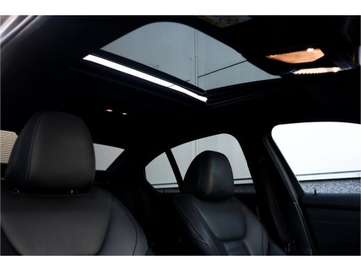 BMW 3 Serie 330e High Ex M-Sport Frozen / Glazen dak / Adaptief onderstel / Electrische stoelen / ActivLease financial lease