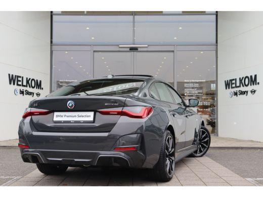 BMW i4 eDrive40 High Executive M Sport / Schuif-kanteldak / Trekhaak / Laserlight / Achteruitrijcamera /... ActivLease financial lease