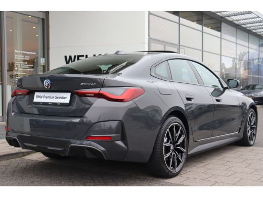 BMW i4 eDrive40 High Executive M Sport / Schuif-kanteldak / Trekhaak / Laserlight / Achteruitrijcamera /... ActivLease financial lease