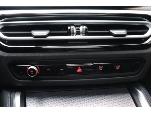 BMW i4 eDrive40 High Executive M Sport / Schuif-kanteldak / Trekhaak / Laserlight / Achteruitrijcamera /... ActivLease financial lease