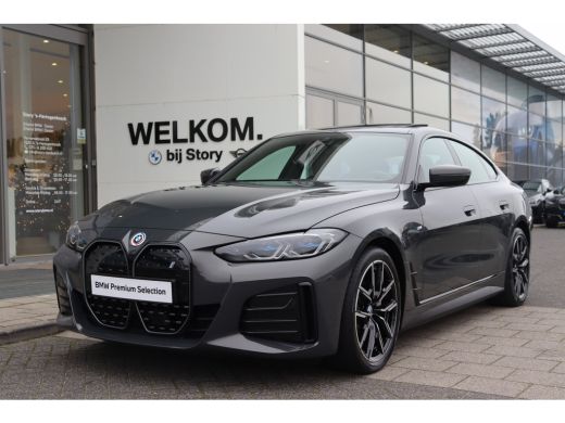 BMW i4 eDrive40 High Executive M Sport / Schuif-kanteldak / Trekhaak / Laserlight / Achteruitrijcamera /... ActivLease financial lease