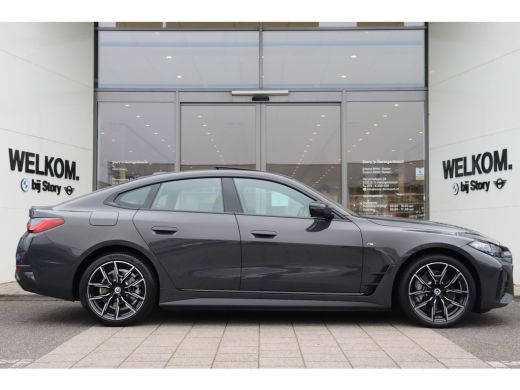 BMW i4 eDrive40 High Executive M Sport / Schuif-kanteldak / Trekhaak / Laserlight / Achteruitrijcamera /... ActivLease financial lease