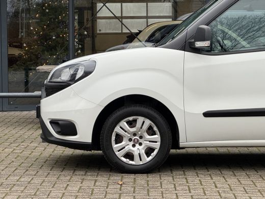 Fiat Dobl&ograve; Cargo 1.3 MJ L1H1 SX Trekhaak/Airco/Navigatie/PDC/Weinig KM! APK 24-02-2027 ActivLease financial lease