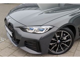 BMW i4 eDrive40 High Executive M Sport / Schuif-kanteldak / Trekhaak / Laserlight / Achteruitrijcamera /...