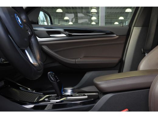 BMW iX3 High Executive / Trekhaak / Sportstoelen / Comfort Access / Adaptieve LED / Parking Assistant Plu... ActivLease financial lease