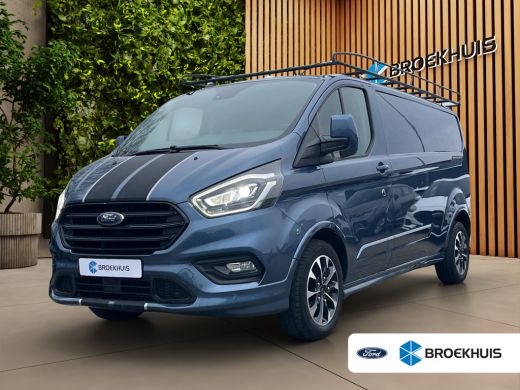 Ford Transit Custom 320 2.0 TDCI L2H1 Sport 185PK | Vloer + Wandbekleding | Trekhaak | Stoelverwarming | Xenon | 17''