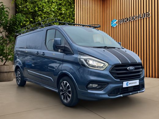 Ford Transit Custom 320 2.0 TDCI L2H1 Sport 185PK | Vloer + Wandbekleding | Trekhaak | Stoelverwarming | Xenon | 17'' ActivLease financial lease