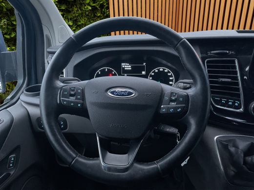 Ford Transit Custom 320 2.0 TDCI L2H1 Sport 185PK | Vloer + Wandbekleding | Trekhaak | Stoelverwarming | Xenon | 17'' ActivLease financial lease
