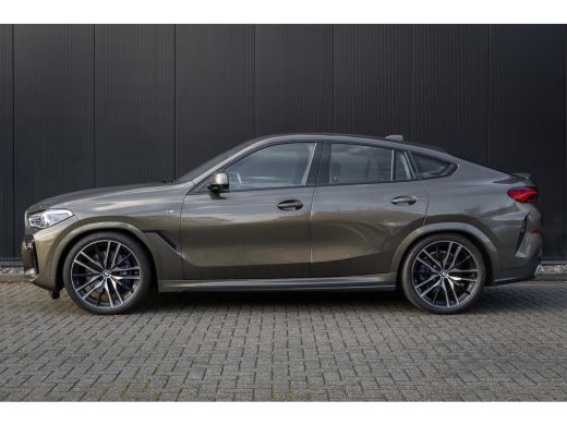BMW X6 xDrive40i High Executive HUD | H&K | Pano | Luchtvering | 360 Camera | Stuurverwarming | Memory s... ActivLease financial lease