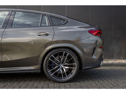 BMW X6 xDrive40i High Executive HUD | H&K | Pano | Luchtvering | 360 Camera | Stuurverwarming | Memory s... ActivLease financial lease