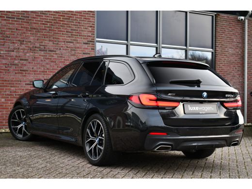 BMW 5 Serie Touring 530e xDrive M-Sport Pano ACC H/K HUD 19inch ActivLease financial lease