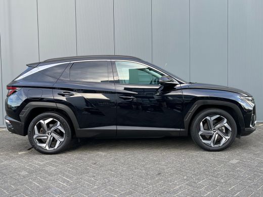 Hyundai Tucson 1.6 T-GDI 265pk PHEV Premium 4WD (299,- p/m Demo Deal!) | Leder | Carplay | Climate | Keyless | N... ActivLease financial lease