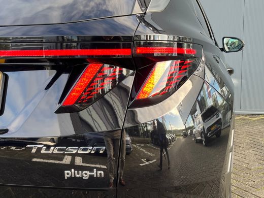 Hyundai Tucson 1.6 T-GDI 265pk PHEV Premium 4WD (299,- p/m Demo Deal!) | Leder | Carplay | Climate | Keyless | N... ActivLease financial lease