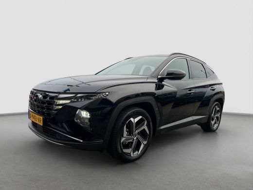 Hyundai Tucson 1.6 T-GDI 265pk PHEV Premium 4WD | Leder | Carplay | Climate | Trekhaak | Navigatie | Elek. Klep ...