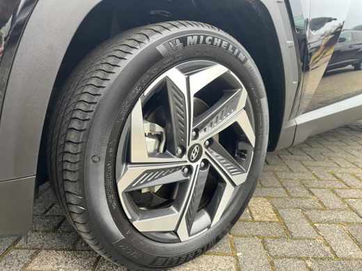 Hyundai Tucson 1.6 T-GDI 265pk PHEV Premium 4WD | Leder | Carplay | Climate | Trekhaak | Navigatie | Elek. Klep ... ActivLease financial lease