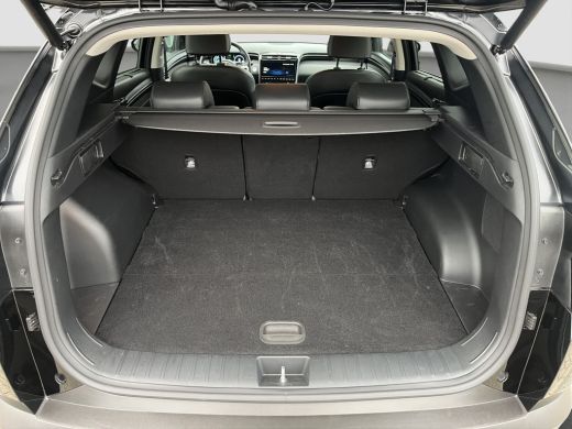 Hyundai Tucson 1.6 T-GDI 265pk PHEV Premium 4WD | Leder | Carplay | Climate | Trekhaak | Navigatie | Elek. Klep ... ActivLease financial lease
