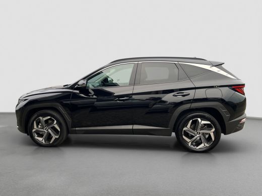 Hyundai Tucson 1.6 T-GDI 265pk PHEV Premium 4WD | Leder | Carplay | Climate | Trekhaak | Navigatie | Elek. Klep ... ActivLease financial lease