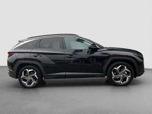 Hyundai Tucson 1.6 T-GDI 265pk PHEV Premium 4WD | Leder | Carplay | Climate | Trekhaak | Navigatie | Elek. Klep ... ActivLease financial lease