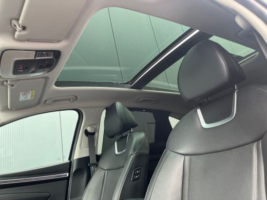 Hyundai Tucson 1.6 T-GDI PHEV 265pk Premium Sky 4WD (299,- p/m Demo Deal!) | Leder | Carplay | Climate | Keyless... ActivLease financial lease