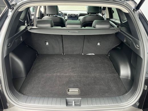 Hyundai Tucson 1.6 T-GDI PHEV 265pk Premium Sky 4WD (299,- p/m Demo Deal!) | Leder | Carplay | Climate | Keyless... ActivLease financial lease