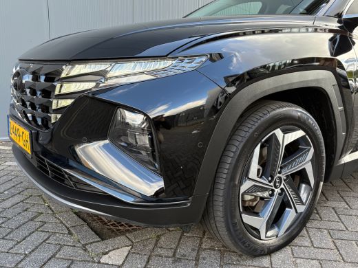 Hyundai Tucson 1.6 T-GDI PHEV 265pk Premium Sky 4WD (299,- p/m Demo Deal!) | Leder | Carplay | Climate | Keyless... ActivLease financial lease