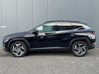 Hyundai Tucson 1.6 T-GDI 265pk PHEV Premium 4WD (299,- p/m Demo Deal!) | Leder | Carplay | Climate | Keyless | N...