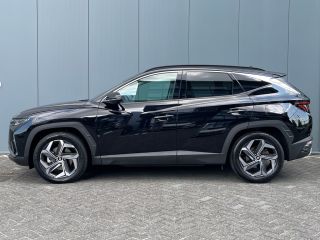 Hyundai Tucson 1.6 T-GDI 265pk PHEV Premium 4WD (299,- p/m Demo Deal!) | Leder | Carplay | Climate | Keyless | N...