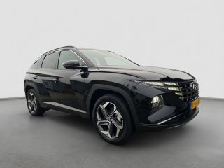 Hyundai Tucson 1.6 T-GDI 265pk PHEV Premium 4WD | Leder | Carplay | Climate | Trekhaak | Navigatie | Elek. Klep ...