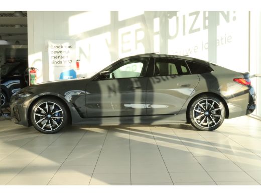 BMW i4 M50 High Executive 84 kWh | SOH 93% | Adapt. Cruise | Carbon | Harman & Kardon | HUD | Schuifdak ... ActivLease financial lease