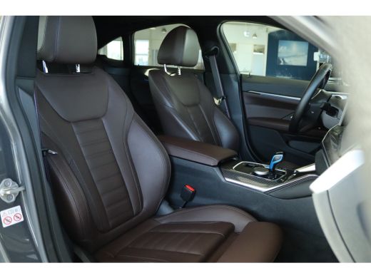 BMW i4 M50 High Executive 84 kWh | SOH 93% | Adapt. Cruise | Carbon | Harman & Kardon | HUD | Schuifdak ... ActivLease financial lease