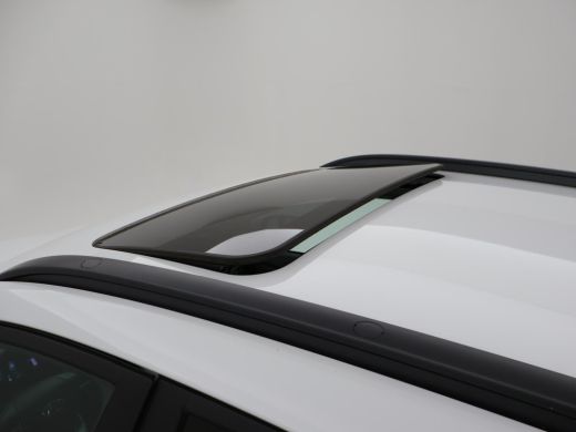 Hyundai Kona EV PREMIUM SKY 64 KWH + SCHUIFDAK | LEDER | TREKHAAK | STOELVENTILATIE | HEAD-UP | CAMERA | ADAPT... ActivLease financial lease