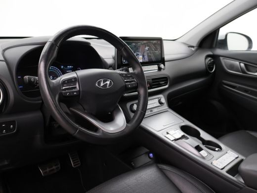 Hyundai Kona EV PREMIUM SKY 64 KWH + SCHUIFDAK | LEDER | TREKHAAK | STOELVENTILATIE | HEAD-UP | CAMERA | ADAPT... ActivLease financial lease