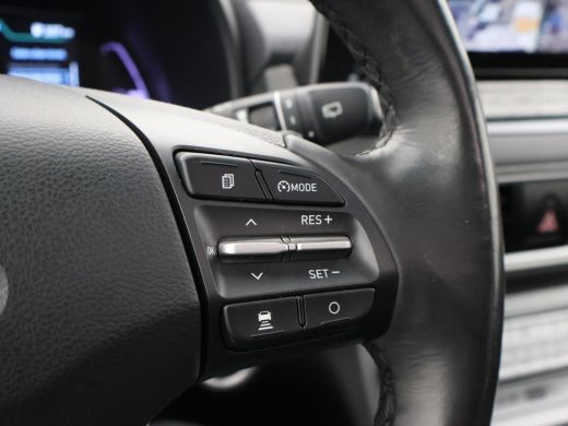 Hyundai Kona EV PREMIUM SKY 64 KWH + SCHUIFDAK | LEDER | TREKHAAK | STOELVENTILATIE | HEAD-UP | CAMERA | ADAPT... ActivLease financial lease