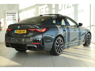 BMW i4 M50 High Executive 84 kWh | SOH 93% | Adapt. Cruise | Carbon | Harman & Kardon | HUD | Schuifdak ...