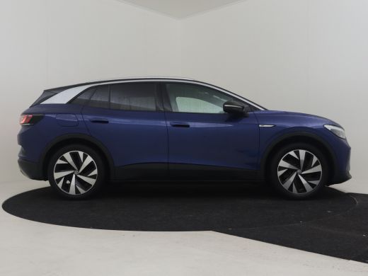 Volkswagen ID.4 First 77 kWh 204pk | Achteruitkijkcamera | Adaptief cruise control | Navigatie | Stoelverwarming ... ActivLease financial lease