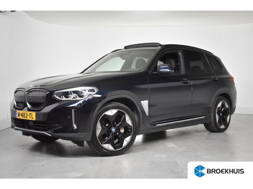 BMW iX3 High Executive 80 kWh | SOH 96,48% | 1e Eigenaar! | Open Dak | Trekhaak | Memory Zetels | Sfeerve...